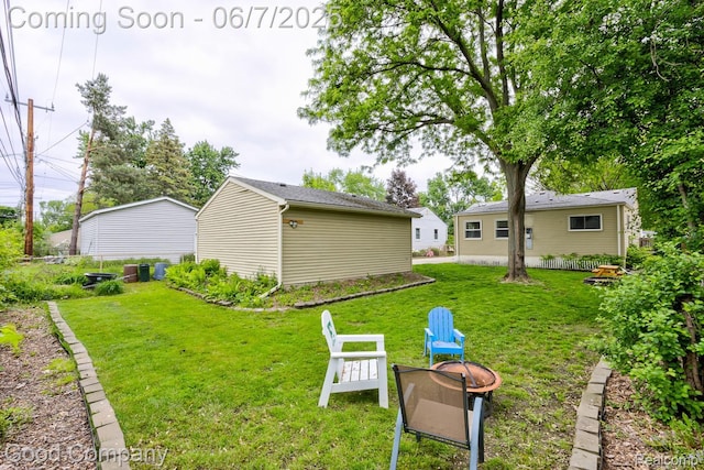 4511 Rosewold Ave, Royal Oak, MI 48073 - view of green lawn with a fire pit