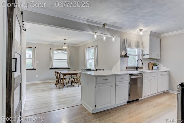 4511 Rosewold Ave, Royal Oak, MI 48073 - kitchen with dishwasher, a sink, light wood-style flooring, healthy amount of natural light, and ornamental molding