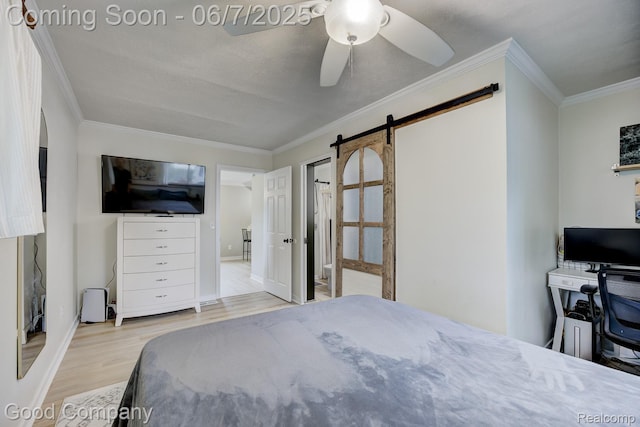 4511 Rosewold Ave, Royal Oak, MI 48073 - bedroom featuring ornamental molding, wood finished floors, a barn door, and a ceiling fan