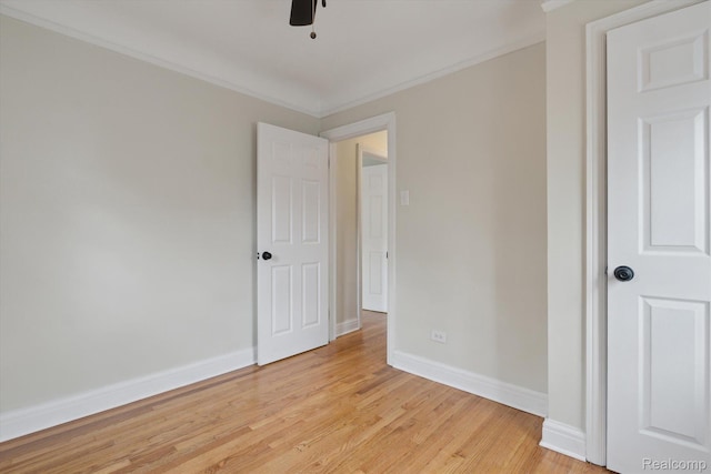 5784 Whittier St, Detroit, MI 48224 - unfurnished bedroom with light wood-type flooring, baseboards, crown molding, and ceiling fan
