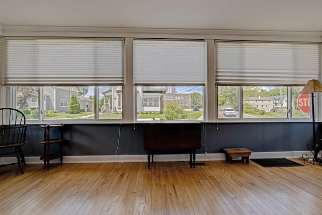 350 N Broadway St, Lake Orion, MI 48362 - living area featuring plenty of natural light, light wood-style flooring, and baseboards
