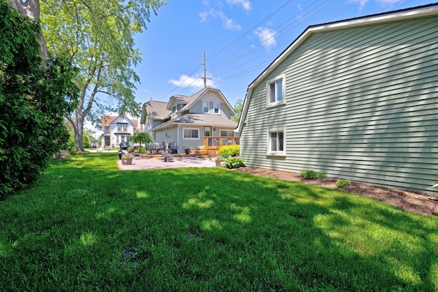 350 N Broadway St, Lake Orion, MI 48362 - view of green lawn with a patio