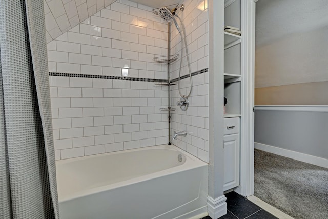 350 N Broadway St, Lake Orion, MI 48362 - full bathroom with shower / bath combination with curtain, baseboards, tile patterned floors, and a spacious closet