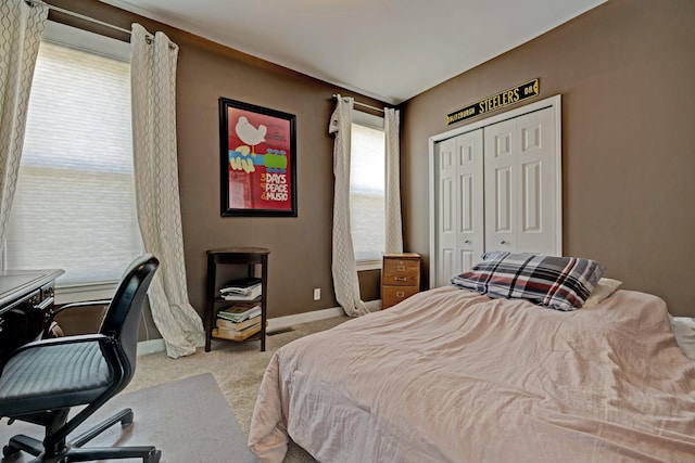 350 N Broadway St, Lake Orion, MI 48362 - carpeted bedroom with baseboards, a desk, and a closet