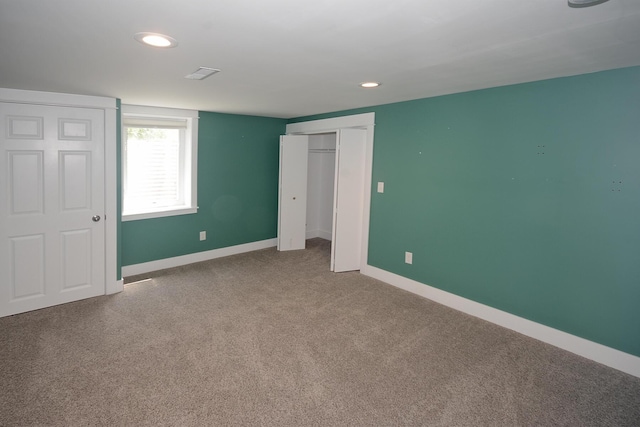 222 S Park St, Zeeland, MI 49464 - unfurnished bedroom featuring baseboards, carpet, recessed lighting, and a closet