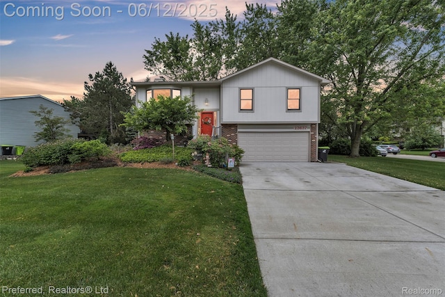 23637 Cranbrooke Dr, Novi, MI 48375 - view of front facade with brick siding, a garage, a lawn, and concrete driveway