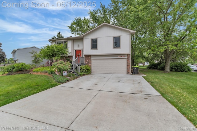 23637 Cranbrooke Dr, Novi, MI 48375 - bi-level home featuring brick siding, a garage, a front yard, and concrete driveway