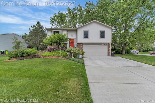23637 Cranbrooke Dr, Novi, MI 48375 - raised ranch featuring brick siding, an attached garage, a front lawn, and driveway