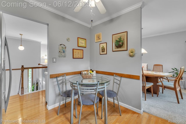 23637 Cranbrooke Dr, Novi, MI 48375 - dining room with wood finished floors, ornamental molding, a ceiling fan, and baseboards