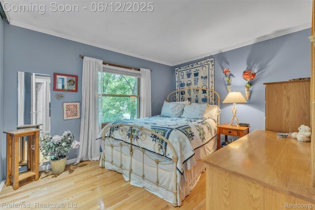 23637 Cranbrooke Dr, Novi, MI 48375 - bedroom featuring ornamental molding and wood finished floors