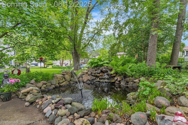23637 Cranbrooke Dr, Novi, MI 48375 - view of yard featuring a garden pond