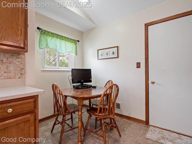 864 Challenging Trl, South Lyon, MI 48178 - office featuring vaulted ceiling and baseboards