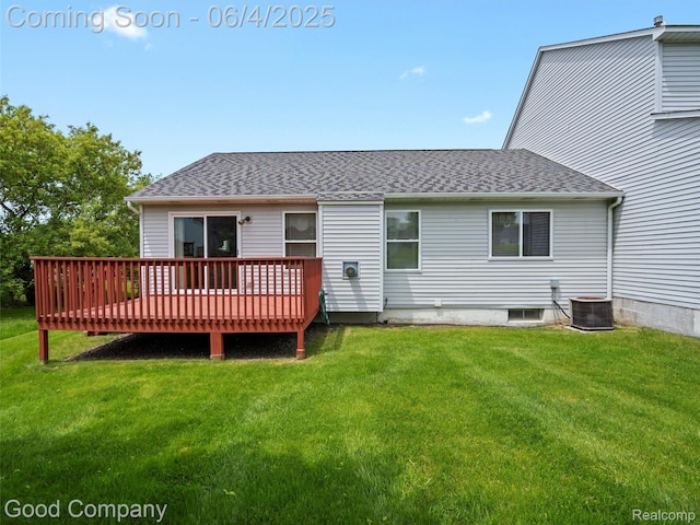 864 Challenging Trl, South Lyon, MI 48178 - back of property with a deck, a shingled roof, a yard, and central AC