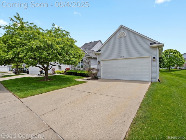 864 Challenging Trl, South Lyon, MI 48178 - view of front of property featuring a front lawn, a garage, and driveway