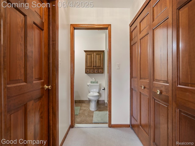 864 Challenging Trl, South Lyon, MI 48178 - bathroom with toilet, baseboards, and a closet