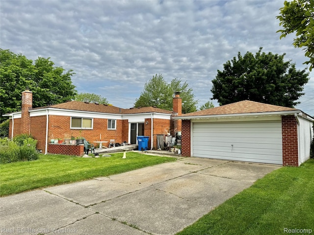 32008 Bunert Rd, Warren, MI 48088 - ranch-style house featuring a chimney, brick siding, and a front yard