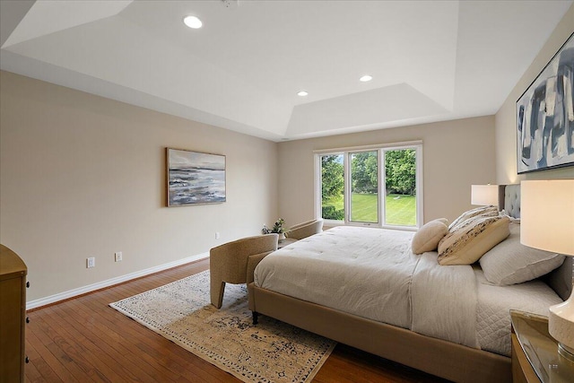 998 Eagle Ave, Ann Arbor, MI 48103 - bedroom with a tray ceiling, baseboards, wood-type flooring, and recessed lighting