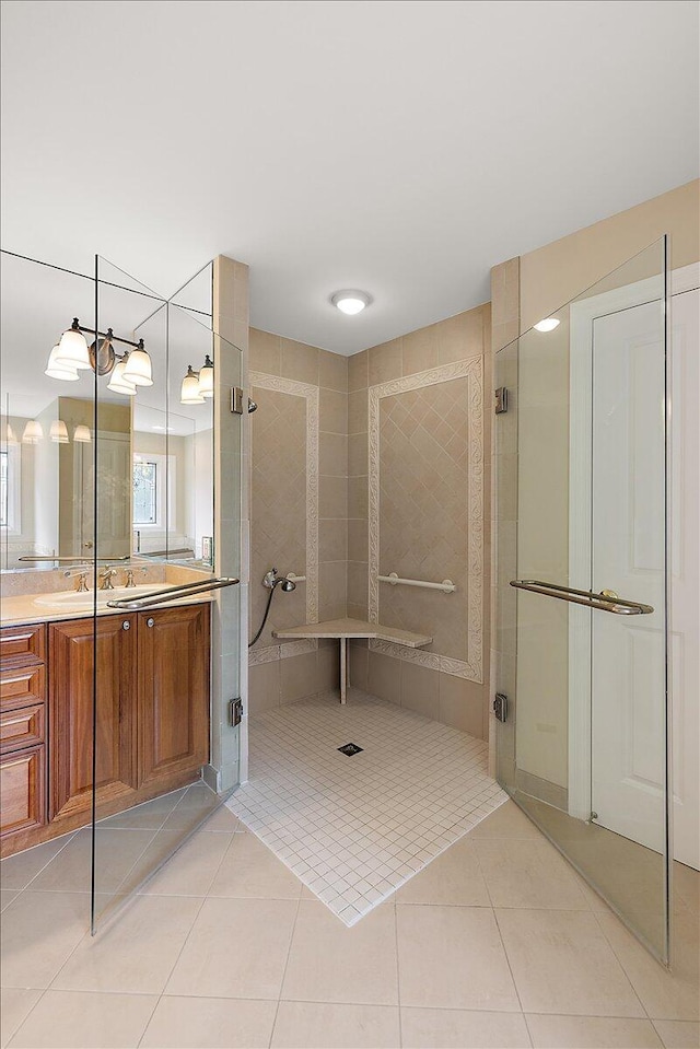 998 Eagle Ave, Ann Arbor, MI 48103 - full bathroom featuring vanity, tile patterned flooring, and tiled shower