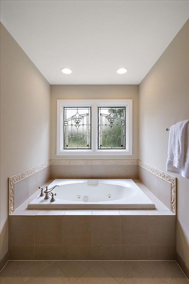 998 Eagle Ave, Ann Arbor, MI 48103 - bathroom featuring a jetted tub and tile patterned flooring