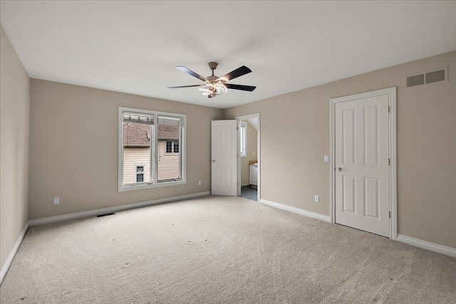 998 Eagle Ave, Ann Arbor, MI 48103 - unfurnished bedroom featuring baseboards, carpet flooring, ensuite bathroom, and ceiling fan