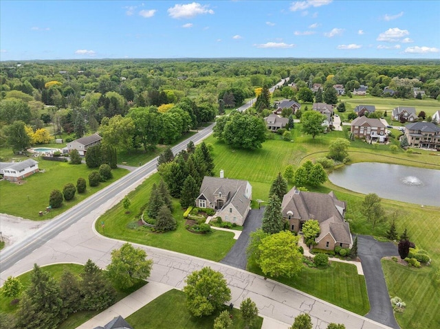 998 Eagle Ave, Ann Arbor, MI 48103 - aerial perspective of suburban area with a nearby body of water and a heavily wooded area