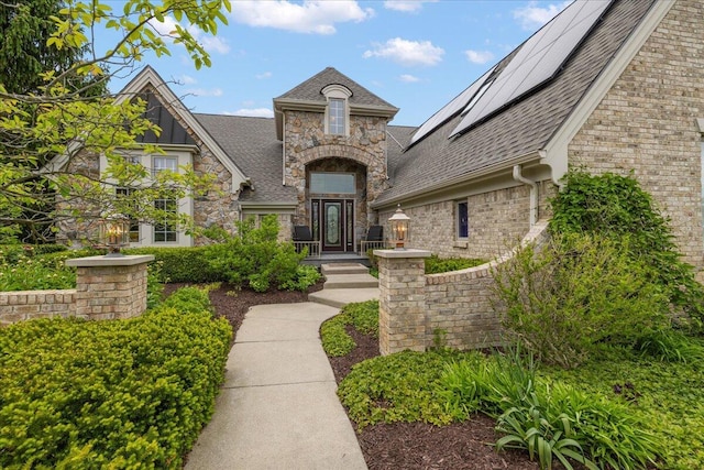 998 Eagle Ave, Ann Arbor, MI 48103 - entrance to property featuring roof with shingles and stone siding