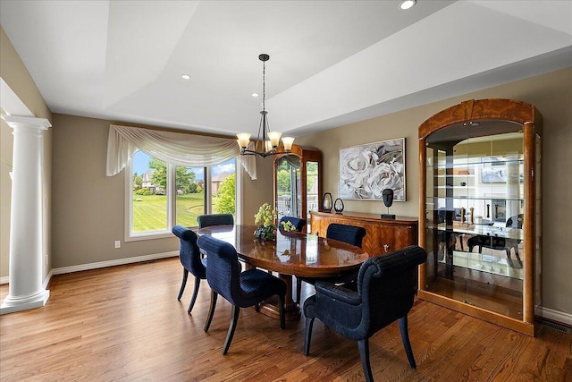 998 Eagle Ave, Ann Arbor, MI 48103 - dining room with light wood-type flooring, plenty of natural light, ornate columns, and recessed lighting