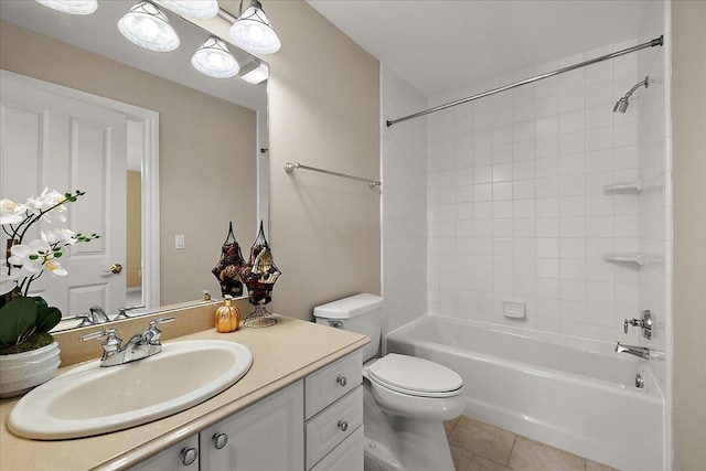 998 Eagle Ave, Ann Arbor, MI 48103 - bathroom with vanity, tile patterned floors, toilet, and tub / shower combination