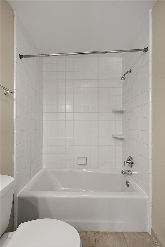 998 Eagle Ave, Ann Arbor, MI 48103 - bathroom with toilet, tile patterned floors, and tub / shower combination