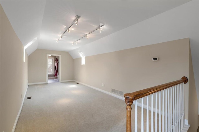 998 Eagle Ave, Ann Arbor, MI 48103 - bonus room featuring baseboards, carpet flooring, and lofted ceiling