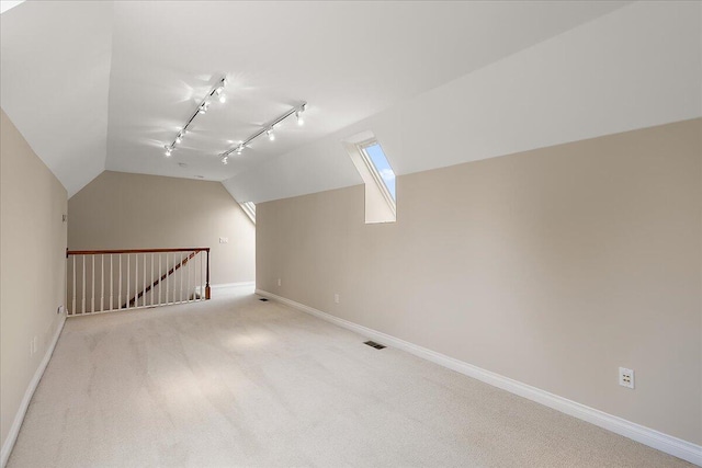 998 Eagle Ave, Ann Arbor, MI 48103 - bonus room featuring light colored carpet, lofted ceiling, and baseboards