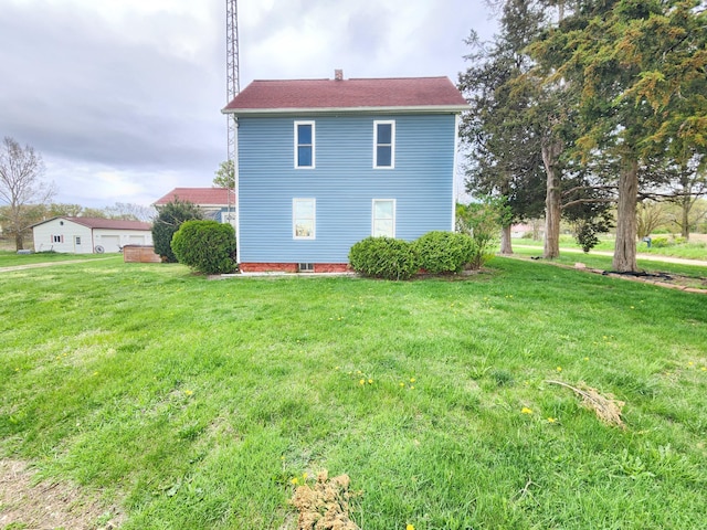 1232 Smoker Rd, Bronson, MI 49028 - view of property exterior with a lawn and a chimney