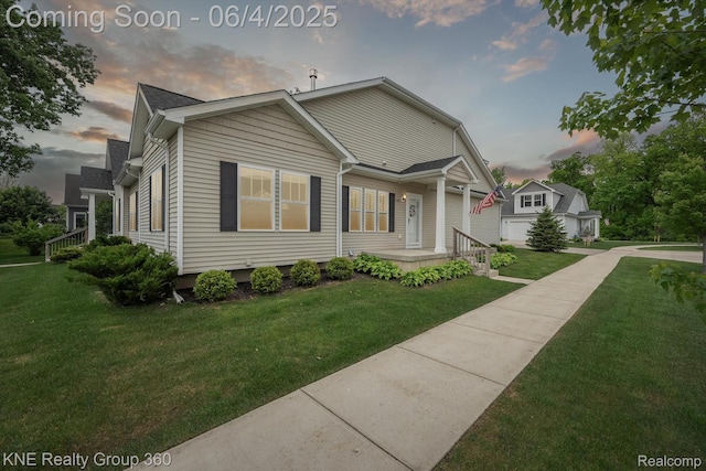 1720 Carlisle St, Howell, MI 48855 - view of front of home featuring a front yard
