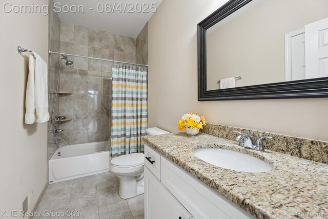 1720 Carlisle St, Howell, MI 48855 - bathroom with vanity, shower / bath combo with shower curtain, and toilet