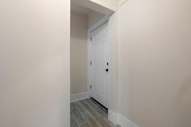 1174 Taylor St, Detroit, MI 48202 - doorway to outside featuring wood finish floors and baseboards