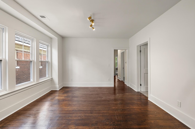 1174 Taylor St, Detroit, MI 48202 - unfurnished room featuring dark wood-style floors and baseboards