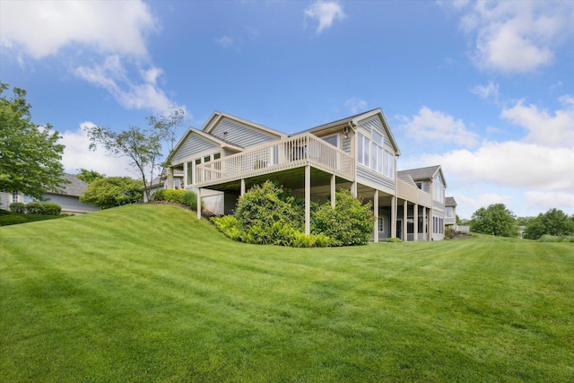 7645 Greenbrier Dr NE, Rockford, MI 49341 - back of house with a yard and a deck