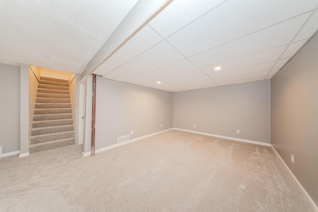 242 S Wallace Blvd, Ypsilanti, MI 48197 - finished basement with carpet floors, stairway, baseboards, a drop ceiling, and recessed lighting