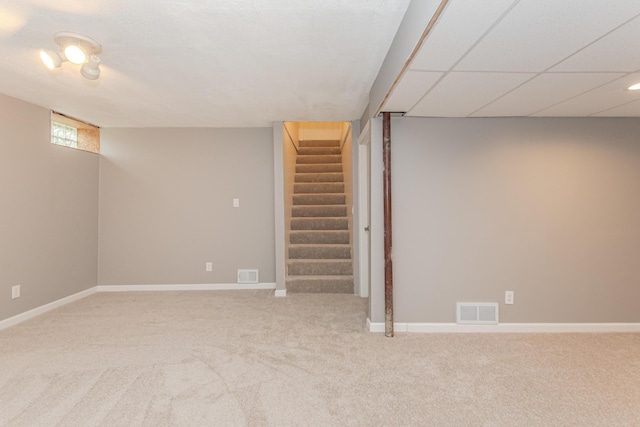 242 S Wallace Blvd, Ypsilanti, MI 48197 - below grade area with carpet, stairs, and baseboards