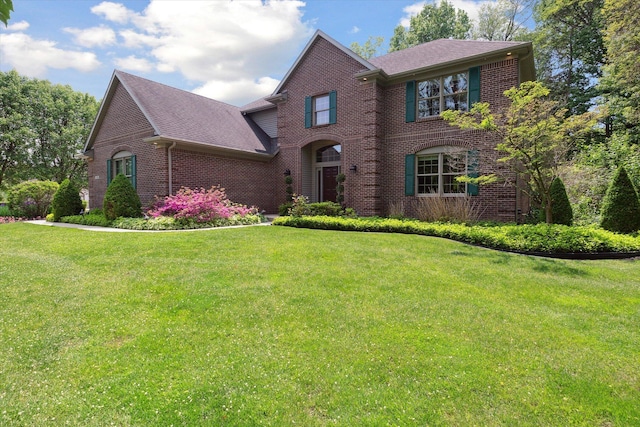 71438 Forest Eagle Ln, Niles, MI 49120 - view of front of property featuring brick siding, a front yard, and a shingled roof