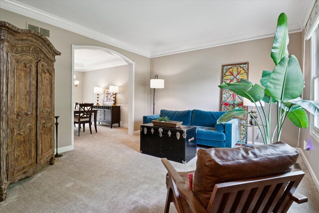 71438 Forest Eagle Ln, Niles, MI 49120 - living room with light carpet, arched walkways, ornamental molding, and baseboards