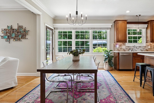 71438 Forest Eagle Ln, Niles, MI 49120 - dining space featuring a chandelier, light wood-style floors, ornamental molding, baseboards, and recessed lighting