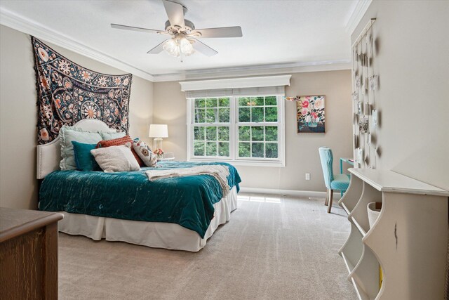 71438 Forest Eagle Ln, Niles, MI 49120 - carpeted bedroom featuring ornamental molding, a ceiling fan, and baseboards