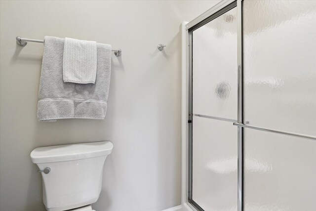 71438 Forest Eagle Ln, Niles, MI 49120 - bathroom featuring a shower stall and toilet