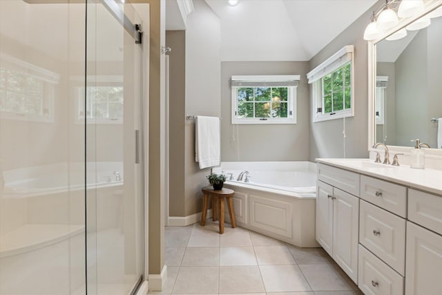 71438 Forest Eagle Ln, Niles, MI 49120 - bathroom with vanity, a garden tub, lofted ceiling, a stall shower, and tile patterned floors