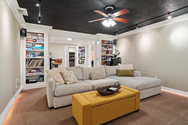 71438 Forest Eagle Ln, Niles, MI 49120 - carpeted living room featuring track lighting, crown molding, baseboards, ceiling fan, and built in shelves