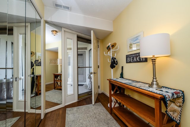 193 Wayne St, Saint Joseph, MI 49085 - foyer with french doors, wood finished floors, and baseboards
