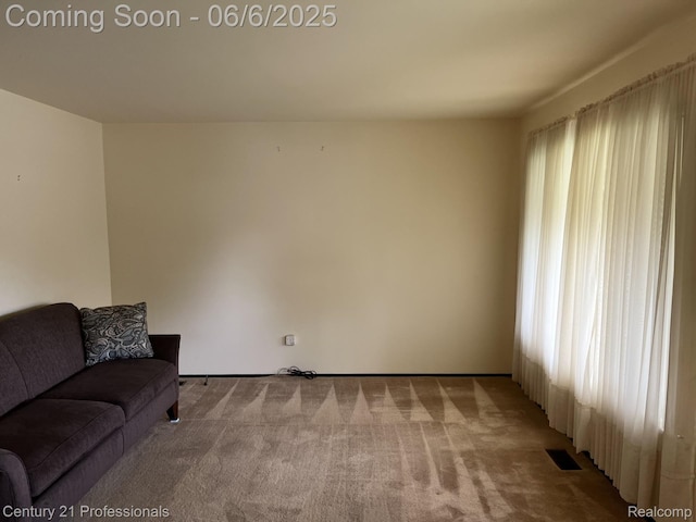 3028 Earl Dr, Warren, MI 48092 - unfurnished living room featuring light carpet