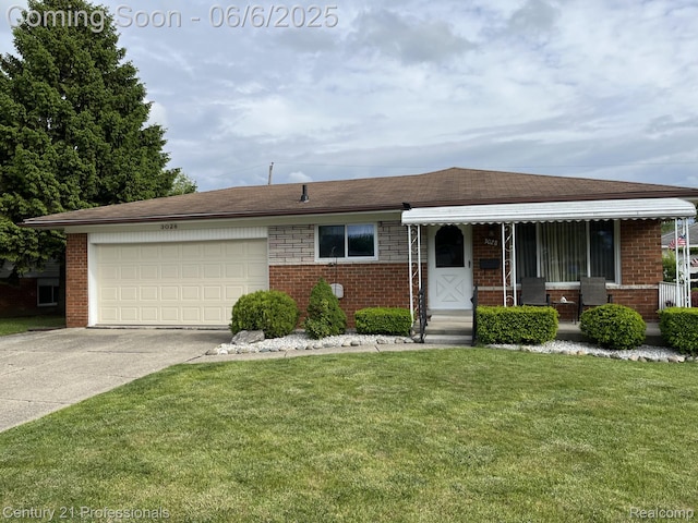 3028 Earl Dr, Warren, MI 48092 - view of front of house featuring brick siding, concrete driveway, an attached garage, and a front yard