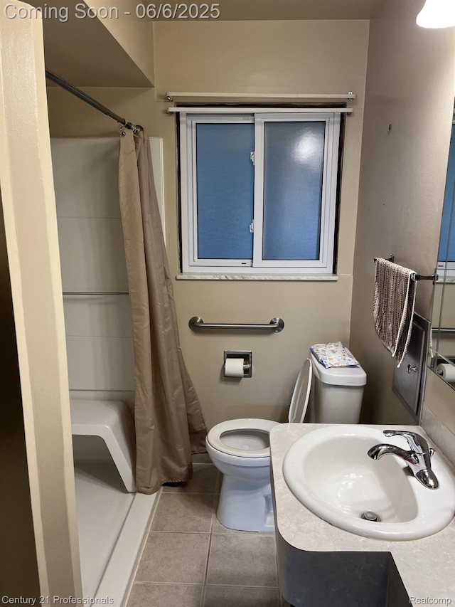 3028 Earl Dr, Warren, MI 48092 - full bathroom featuring toilet, tile patterned floors, a stall shower, and vanity